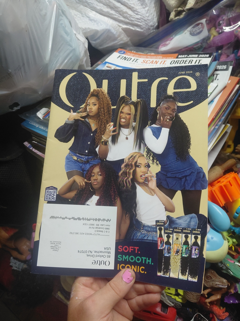 Outre hair and wig catalog featuring five models posing on the cover june 2026